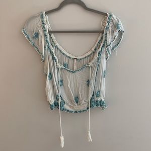 Free People Cropped, slightly see through, cream top.
